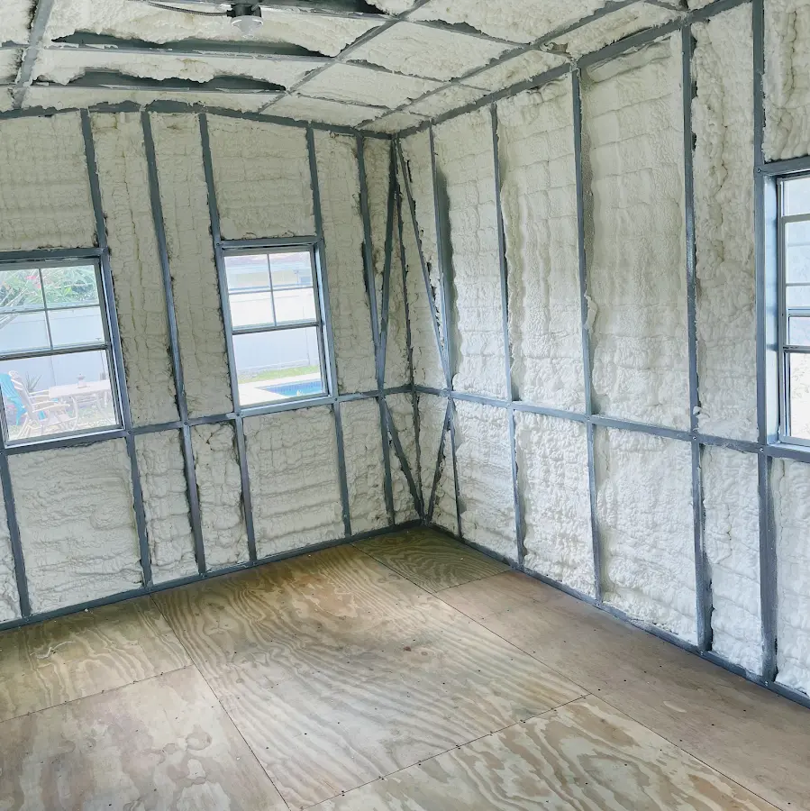 Closed-cell spray foam insulation applied to wall cavities in a residential project in Mount Airy